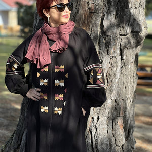 Salma-embroidered-zip-front-long-coat-abaya-with-side-pockets-in-black-close-up-front-view