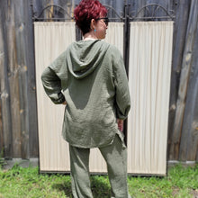 Load image into Gallery viewer, Ada-women&#39;s-muslin-hooded-button-front-shirt-in-khaki-worn-with-tie-waist-muslin-pants-khaki-back-view
