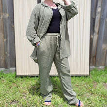 Load image into Gallery viewer, muslin-women&#39;s-tie-waist-pants-featuring-elasticated-string-tie-waist-and-side-pockets-in-khaki-worn-with-Ada-muslin-hooded-shirt-in-khaki-layered-look
