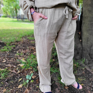 muslin-women's-tie-waist-pants-featuring-elasticated-string-tie-waist-and-side-pockets-in-latte-worn-with-Ada-muslin-hooded-shirt-in-latte-close-up