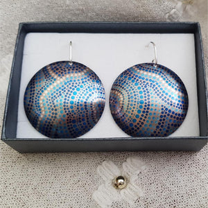 handmade-large-domed-earrings-featuring-a-source-of-life-indigenous-artwork-imprinted-on-aluminium-sheeting-with-sterling-silver-hooks-in-gift-box