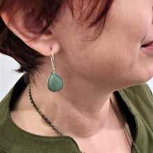 Load image into Gallery viewer, aventurine-crystal-light-jade-green-teardrop-earrings-with-sterling-silver-hooks-on-model
