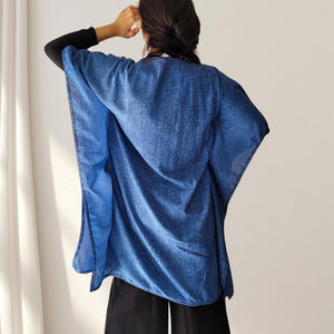 cotton-kimono-tunic-with-V-neckline-short-batwing-sleeves-and-straight-hemline-with-lace-edging-and-front-string-tie-with-tassel-trim-in-indigo-back-view