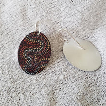 Load image into Gallery viewer, handmade-flat-oval-earrings-featuring-essence-at-dusk-indigenous-artwork-imprinted-on-aluminium-sheeting-with-sterling-silver-hooks-front-and-back
