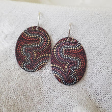 Load image into Gallery viewer, handmade-flat-oval-earrings-featuring-essence-at-dusk-indigenous-artwork-imprinted-on-aluminium-sheeting-with-sterling-silver-hooks
