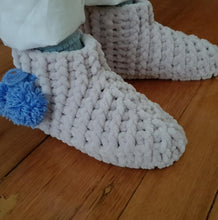 Load image into Gallery viewer, kids-crochet-slipper-boots-in-soft-velvet-yarn-grey-with-blue-pompom-side-view-close-up-on-feet
