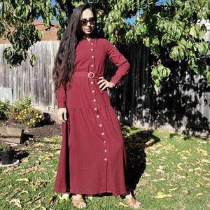 long-sleeve-button-through-cotton-maxi-dress-in-burgundy-with-fabric-belt-shirt-collar-buttoned-cuffs-and-gathered-tier-in-skirt-from-the-hips