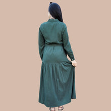 Load image into Gallery viewer, long-sleeve-button-through-cotton-maxi-dress-in-green-with-fabric-belt-shirt-collar-buttoned-cuffs-and-gathered-tier-in-skirt-from-the-hips-back-view
