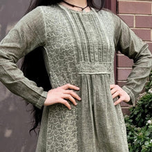 Load image into Gallery viewer, long-sleeve-cotton-maxi-dress-in-khaki-with-eyelet-embroidery-on-front-sides-pintuck-detail-on-chest-lace-close-up-of-front-detail
